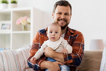 Image showing happy father with little baby boy at home