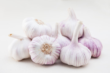 Image showing garlic bulbs on white background