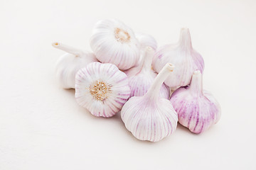 Image showing garlic bulbs on white background