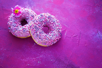 Image showing delicious pink donuts