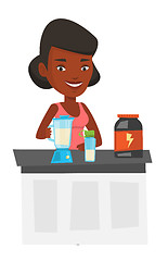 Image showing Young woman making protein cocktail.