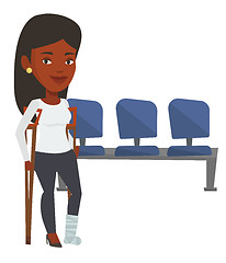 Image showing Woman with broken leg and crutches.