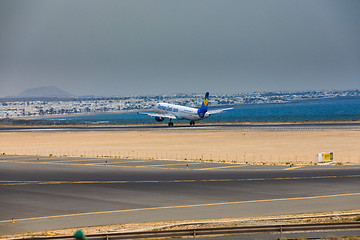 Image showing ARECIFE, SPAIN - APRIL, 16 2017: AirBus A321 of ThomasCook.com w