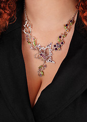 Image showing Closeup of necklace on a woman