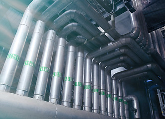 Image showing Equipment, cables and piping as found inside of a modern industr