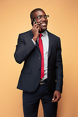 Image showing Young african business man on the phone