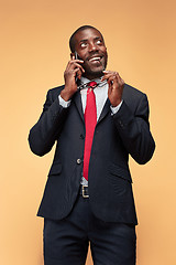 Image showing Young african business man on the phone