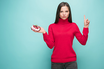 Image showing Beautiful women holding small cake. Birthday, holiday.