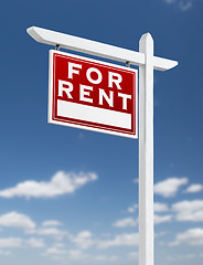 Image showing Left Facing For Rent Real Estate Sign on a Blue Sky with Clouds.