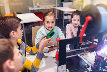 Image showing happy children with 3d printer at robotics school