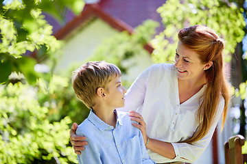 Image showing happy mother and son at summer garden