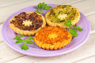 Image showing Three mini vegetarian quiches