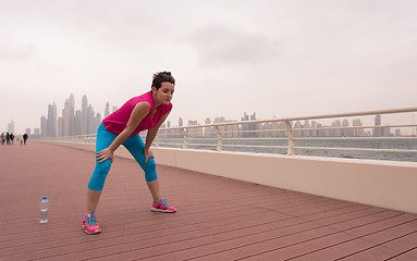 Image showing woman stretching and warming up