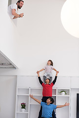 Image showing young boys posing line up piggyback