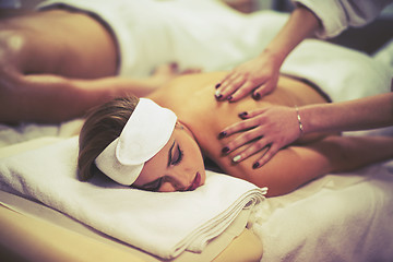 Image showing couple receiving a back massage