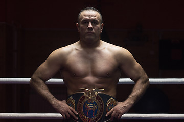 Image showing kick boxer with his championship belt