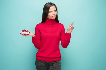 Image showing Beautiful women holding small cake. Birthday, holiday.