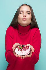 Image showing Beautiful women holding small cake. Birthday, holiday.