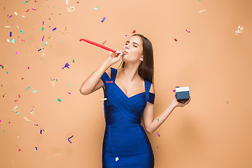 Image showing The woman celebrating birthday on brown background