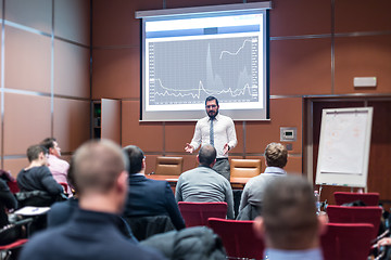 Image showing Skiled Public Speaker Giving a Talk at Business Meeting.