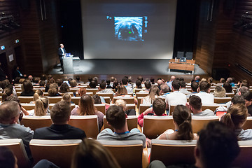 Image showing Speaker giving presentation on health care conference.