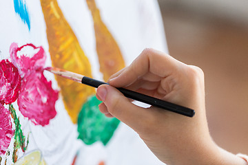 Image showing artist with brush painting still life picture