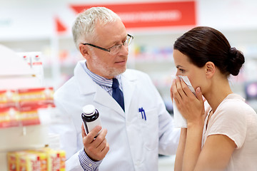 Image showing apothecary and sick customer at pharmacy