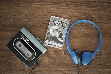 Image showing Vintage walkman, the prodigy cassete and headphones.