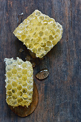 Image showing Honeycomb on a vintage wooden table