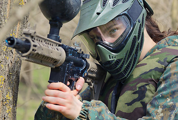 Image showing Paintball player under attack 