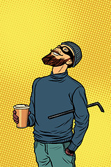 Image showing Robber thief hacker drinks coffee and looks up