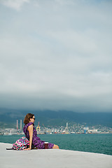 Image showing Woman enjoying seascape on waterfront