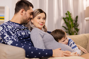 Image showing happy family with pregnant mother at home