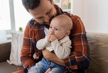 Image showing close up of happy father with little baby at home