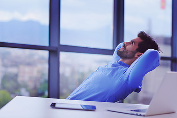 Image showing happy young business man at office