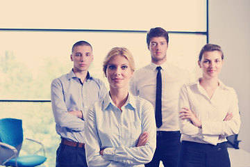 Image showing business woman with her staff in background at office