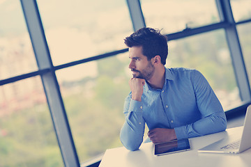 Image showing happy young business man at office