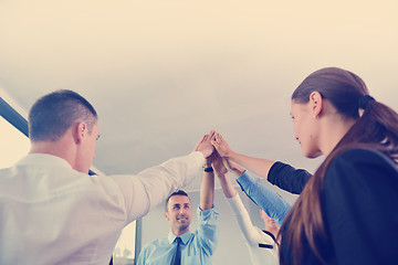 Image showing business people group joining hands