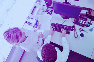 Image showing business people in a meeting at office