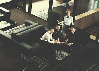 Image showing business people in a meeting at office