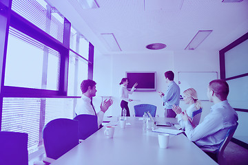 Image showing business people in a meeting at office