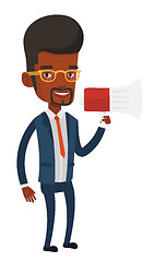 Image showing Young business man speaking into megaphone.