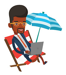 Image showing Business man working on laptop at the beach.