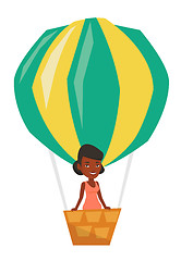 Image showing Woman flying in hot air balloon.