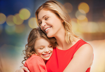 Image showing happy mother and daughter hugging