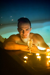 Image showing man relaxing in the jacuzzi