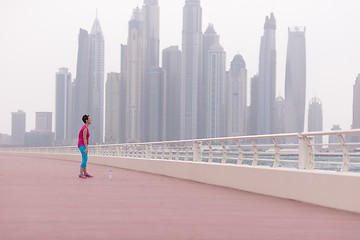 Image showing woman stretching and warming up