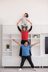 Image showing young boys posing line up piggyback