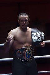 Image showing kick boxer with his championship belt