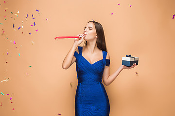 Image showing The woman celebrating birthday on brown background